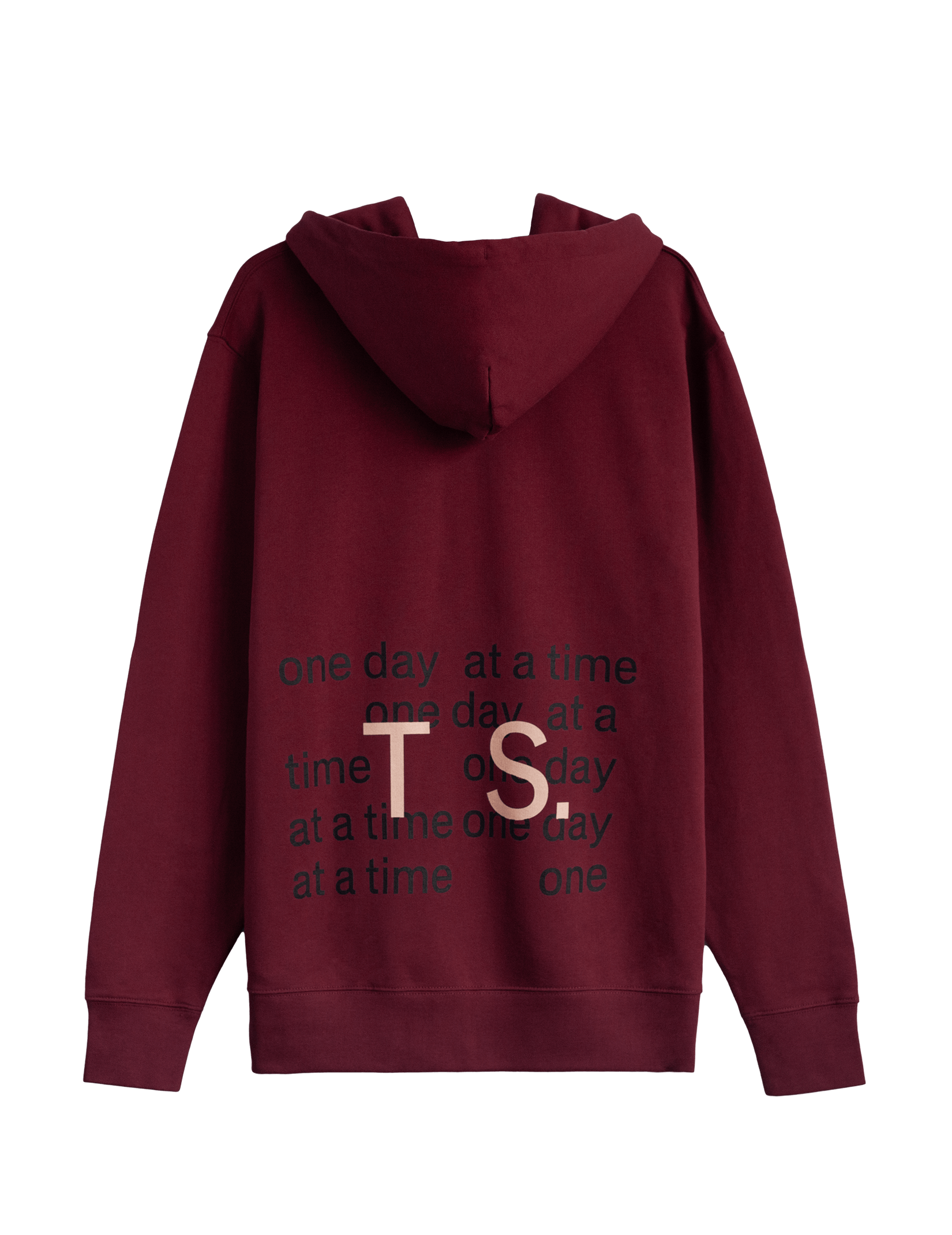 A dark red hoodie viewed from the back, with a black print that says ‘one day at a time’ repeatedly. On top of this the letters TS (large, in coral) are overlaid.